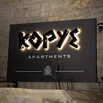κόρυς * Karpenísion